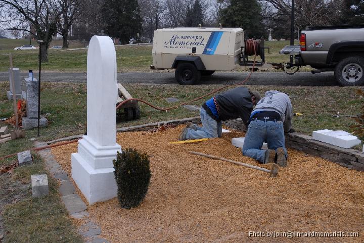 2007-02-02_JAK_8527.JPG - The markers being placed at the foot of the graves.
