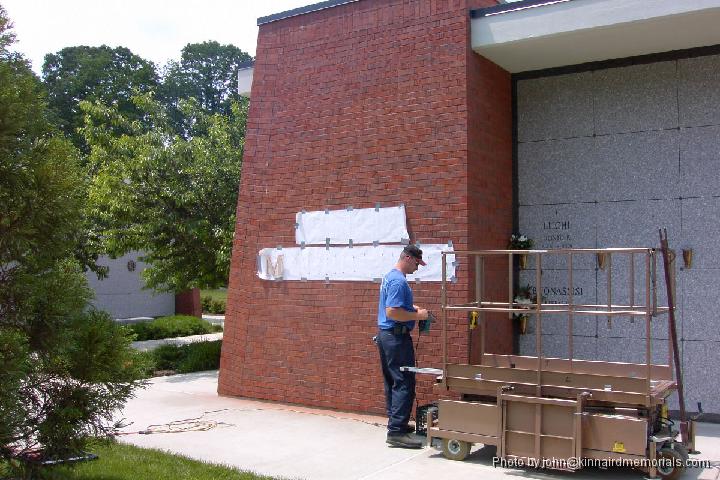 2002-05-17__PDRM3005.JPG - Laying out the placement of the lettering.